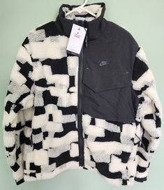 New with tag Men's Nike Therma-FIT Tech Pack Engineered Sherpa Jacket DD6632-010 Size - Small Color - Black/White All my clothes are brand new deadstock never worn and 100% Authentic Guaranteed!!!  I don't sell fake, counterfeit, or knockoff clothes. Period!!!  All my clothes come from a smoke free and pet free environment.  Clothes come with 1 to 3 days free priority shipping with tracking number.  Feel free to check all our pictures and positive feedback for great service we provide to our cus Tech Pack, My Clothes, Sherpa Jacket, Stay Safe, Men's Nike, Positive Feedback, Men's Jacket, Vest Jacket, Tracking Number