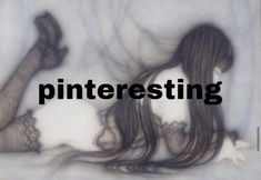 a woman laying on her stomach with the words pinteresting in front of her