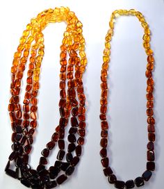 Baltic Amber Rainbow Square Bead Necklace Natural Baltic Amber Bead Strand/Necklace, beads are square-rectangle shaped and range from 9X8X5mm-20X11X4mm. One Necklace is 27" in length. A Rainbow of Baltic Amber Bead Colors! There is a small plastic screw clasp in the back. You will receive One Necklace! Made in Lithuania. Arrives to your home with the "All About Amber" Brochure which includes care instructions! Thank you for looking! Baltic Clothing, Baltic Jewelry, Amber Bead Necklace, Baltic Amber Jewelry, Necklace Beads, Amber Ring, Amber Necklace, Amber Beads, Square Bead