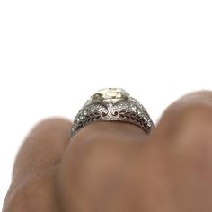 *VIEW A VIDEO OF THIS RING* https://youtu.be/Malcez6MWnM Description: Here we have an 1910 Edwardian Platinum 1.71 Rose Cut and .25cttw Antique European Cut Diamonds Engagement Ring! This ring has a lot of beautiful and unique filigree around the shank! It stands tall all the way up to the center stone, bringing attention not only to the diamond but the metal work as well! This is a true antique piece, and we are honored to offer it to our Etsy family. This ring can be sized up or down 4 sizes f Antique Gia Certified Round Cut Ring, Antique Gia Certified Diamond Ring For Anniversary, Vintage Gia Certified Round Cut Halo Ring, Anniversary Filigree Ring With Round Cut Rose Diamonds, European Cut Diamond Engagement Ring, Citrine Ring Engagement, Diamonds Engagement Ring, European Cut Diamonds, All The Way Up