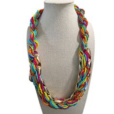 Double Strand Multi-Color Seed Bead And Metal Necklace -- 24". This necklace has a double strand made up of Six strands of glass beads: Orange, Blue, Red, Green, Pink, and Bronze. These strands are fed through an open gold-tone metal link, Measurements: Length: 24; Width: 1-1/2"; Extender: 3"0 Adjustable Chain Necklace With Colorful Round Beads, Adjustable Multicolor Beaded Chain Necklace, Multicolor Beaded Chain Long Necklace For Party, Multicolor Beaded Chain Layered Necklace As Gift, Multicolor Beaded Chain Layered Necklace For Gift, Adjustable Multicolor Beaded Layered Necklace, Multicolor Bohemian Necklace With Round Beads, Adjustable Multi-strand Beaded Chain Necklace, Multi-strand Glass Necklaces With Faceted Beads