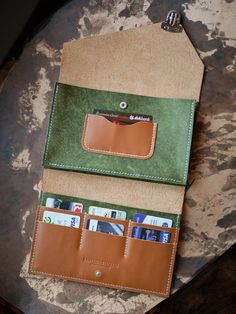 Crafted from premium full-grain leather, this personalized wallet purse is the perfect gift for Dad or anyone who values quality and style. With spacious compartments for cards, cash, and even a phone, this leather clutch is as functional as it is stylish. Add a custom name or initials for a personal touch that makes it uniquely yours. Built to last, this versatile pouch is perfect for everyday use or special occasions.  DETAILS: -Full grain vegetable leather  -7 compartments for for up to 14 ca Personalized Clutch, Unique Gifts For Dad, Personalized Leather Wallet, Vegetable Leather, Personalized Wallet, Clip Wallet, Mens Leather Bag, Money Clip Wallet, Personalized Leather