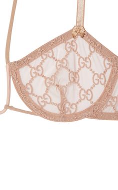 Enhance your lingerie collection with Gucci's exquisite GG Tulle Set. This beige set features intricate embroidery in the iconic GG pattern, along with a bra that boasts adjustable straps and a hook-and-eye fastening at the back. The laces tied at the neck add a touch of sophistication, while the briefs with an elasticated waistband provide both style and comfort. Crafted from 83% polyamide and 17% elastane, this set is the epitome of luxury and exclusivity. Luxury Bra With Lace Trim, Luxury Fitted Beige Intimates, Elegant Pink Bra With Delicate Lace, Fitted Beige Bra With Lace Trim, Luxury Pink Lace Intimates, Chevron Outfit, Chevron Jewelry, Gucci Shop, Vans Blue