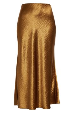 Hammered texture elevates the elegant look of this bias-cut satin skirt in a burnished golden hue that evokes autumnal splendor. 36 1/2" length (size 8) Hidden side-zip closure 100% polyester Dry clean Imported Designer Clothing Gold Maxi Skirt, Gold Long Skirt For Formal Occasions, Glamorous Gold Long Skirt, Gold Satin Party Skirt, Glamorous Long Gold Skirt, Elegant Gold Mini Skirt, Elegant Metallic Long Skirt, Luxury Fitted Gold Skirt, Elegant Metallic Mini Skirt