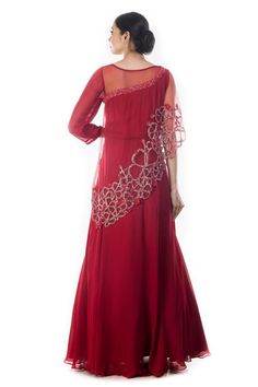 Maroon bead and cutdana embroidered cutwork cape gown with asymmetric sleeves.
Components: 1
Pattern: Embroidered
Type Of Work: Sequin, Cutdana
Neckline: Round
Sleeve Type: Asymmetric
Fabric: Georgette, Net
Color: Maroon
Other Details: 
Attached tafetta lining
Gown Length: 60 inches
Disclaimer: Possibility of slight color variation
Occasion: Reception, Sangeet - Aza Fashions Party Dresses With Zari Work And Cape Sleeves, Eid Evening Floor-length Gown, Floor-length Evening Gown For Eid, Hand Embellished Evening Sets In Floor-length, Hand Embellished Floor-length Evening Sets, Bollywood Gown With Resham Embroidery For Evening, Evening Lehenga With Resham Embroidery In Maxi Length, Festive Gown With Zari Work And Cape Sleeves, Festive Gown With Sheer Dupatta And Cape Sleeves