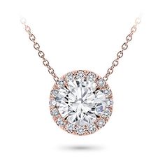 This halo pendant setting is stunning and can accommodate a round center diamond of your choice from 0.20-5.0ct. Pendant features approx. 18 G-H VS diamonds at approx. 0.20cttw. Metal options are 14k and 18k white and yellow gold, 18k rose, or platinum and includes a 16 chain. Classic Round Pendant Jewelry, Unique Diamond Pendant, Cushion Cut Solitaire, Round Diamond Pendant, Solitaire Diamond Pendant, Diamond Pendants Designs, Halo Necklace, Sparkly Things, Diamond Solitaire Necklace