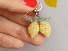 These beautiful beaded Lemon earrings are small and simple, which makes them perfect for everyday wear, but also suitable for special occasions.  ✤ SIZE (Approx.): ▸ Lenght: 2,5 cm (0.98 inches). ✤ MATERIAL: ▸ Pastel yellow and pastel green seed beads (size 11/0). ▸ Strong and durable beading thread. ▸ High quality stainless steel ear wire. Please note that colors may appear slightly different due to variations in monitors and browsers. ✤ SHIPPING: ▸ I will ship as soon as possible, approximatel Dainty Beaded Earrings With Round Beads As Gift, Dainty Adjustable Beaded Earrings, Fruit Earrings, Steel Jewelry, Summer Jewelry, Stainless Steel Jewelry, Jewelry Pieces, Favorite Jewelry, Jewelry Earrings Dangle