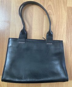 "Vintage 80s Rare Gruppo Italiano  Black Leather Elegant Evening Shoulder Bag HandBag Purse  Made in Italy  Baby Pink Cotton Interior, Two Separate Interior Compartments, Two Interior Zipper Pocket,  Condition is Used. The exterior has some small scuffs. The interior has some light stains. The interior has a tinny hole in the lining. See photo. Overall, its in very good condition. Please use your zoom in option to view all the details. Length 11\" x Width 4\" x Height 8\" Handle Strap drop 9\" T Purse Pink, Pink Interior, Light Stain, Handbag Purse, Pink Cotton, Baby Pink, Purses And Handbags, Zipper Pocket, Bags Handbags