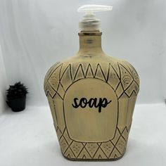 a soap dispenser with the word soap on it