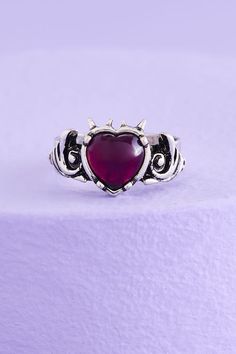 Love your new vibe this heart ring brings! It features a silver-colored adjustable band that pulls apart and a center spiked purple heart pendant. Purple Heart Ring, Nail Ring, Spring Jewelry, Purple Heart, Popsicles, Cute Jewelry, Love Your, Heart Pendant, Silver Color