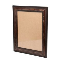 a wooden framed mirror on a white background