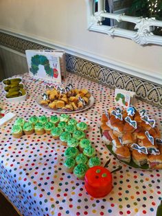 a table topped with lots of different types of food