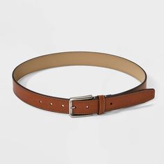 Whether you’re working in the office or lunching with friends, this Dress Belt from Goodfellow & Co™ adds the perfect finishing touch to your look. This dress belt is made from bonded leather for a comfortable and classic look. It also has a shiny silver buckle closure to complete the classy look and allows you to get a customized fit with multiple holes and loop. Pair with any of your pants to feel great all day. Goodfellow & Co™: Where style & fit are always in good company. Classic Fitted Belts For Fall, Casual Belts For Workwear In Spring, Casual Belts For Spring Workwear, Casual Spring Belts For Workwear, Classic Formal Belts For Spring, Classic Spring Formal Belt, Casual Brown Belt For Workwear, Casual Brown Belt For Work, Brown Belt With Self Belt For Workwear