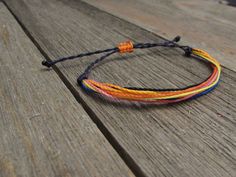 This listing is for a single adjustable string bracelet. Very durable waxed polyester cord. Cord is Waterproof and looks better the more it is worn. Sliding knot adjustable closure. These bracelets are vibrant and really hold their color. They look great stacked with string bracelets or with other styles. Flat Bracelet, Wax Cord Bracelet, Hope Bracelet, String Bracelets, Surfer Bracelets, Brown Bracelet, Bracelet Knots, White Bracelets, Sliding Knot