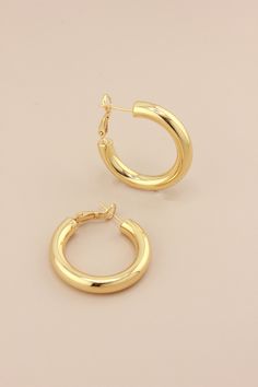 Hoop earrings Gold-filled wide tube hoops. Hoop size is 30.5mm and 6mm wide. Sold in pairs. Custom Bangle, Boo Basket, Trending Bracelets, Chunky Earrings, Trending Necklaces, Earring Trends, Summer Bracelets, Summer Earring, In Pairs