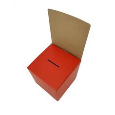 an open red box sitting on top of a white surface with a black line in the middle