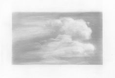 a black and white photo of clouds in the sky