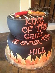 a cake that has been decorated with the words king of the grill is over hill