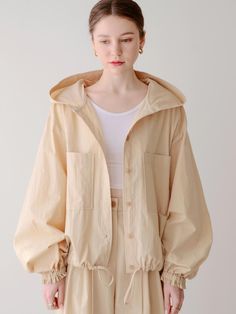 Composition : 53% cotton 47% nylonColor : BEIGE_FREE,BLACK_FREECountry of Origin : Republic of Korea Oversized Cotton Parka For Fall, Beige Long Sleeve Windbreaker With Pockets, Oversized Cotton Parka With Pockets, Oversized Spring Parka, Oversized Long Sleeve Spring Parka, Cotton Outerwear With Double-lined Hood, Spring Utility Cotton Jacket, Spring Solid Color Cotton Utility Jacket, Spring Hoodie With Pockets Relaxed Fit