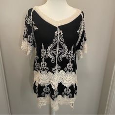 Est. 1946 Black V-Neck Cream Crocheted Lace Trim Tunic Blouse Nwt Beautiful Embroidery Crocheted Lace Trim With Cut-Outs 3/4 Sleeves Pullover Women’s Size M P489 Cream V-neck Top With Crochet Trim, Vintage Black V-neck Top, Elegant V-neck Lace Top For Beach, Black Short Sleeve Tops With Lace Sleeves, Black Short Sleeve Top With Lace Sleeves, Black Top With Lace Short Sleeves, Chic V-neck Blouse With Crochet Trim, Black Top With Lace Sleeves, Summer V-neck Top With Lace Work