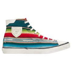 Saint Laurent Mens 'Mexican Jacquard' Bedford High Top Sneakers These multicoloured Saint Laurent Beford striped cotton high top sneakers feature a round toe, lace-up front, multicolored stripes, a logo patch at the side and a distressed rubber sole. Designed with a cotton canvas upper, these Saint Laurent trainers will do wonders for your self-esteem, after all, according to Terry Jones: ‘fashion is about change. It has to do with illusion, contributing to our wellbeing, feeding our insecuritie Saint Laurent Jeans, White Leather Sandals, Striped Sneakers, French Fashion Designers, Couture Mode, Leather High Tops, Saint Laurent Shoes, Paradise Island, Vans High Top Sneaker