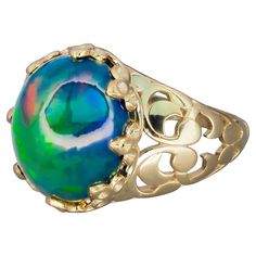 Black opal vitage style ring in 14 karat gold. Ethiopian opal cabochon ring. October Birthstone opal ring. Multicolor opal ring. Material: 14 karat gold Weight: 2.6 - 3 g. (depends from ring size) Set with opal , color - green, blue, red - multy Oval cabochon cut, 2.2-2.5 ct. in total Clarity: Semi Transparent with iclusions Origin: Ethiopia If you wish to see opal best colors and brightness, use a cool desk lamp, or stand directly under a cool LED house light. All opals will look very nice when Luxury Multicolor Opal Cabochon Ring, Luxury Multicolor Cabochon Opal Ring, Yellow Gold Opal Ring With Cabochon, Polished Opal Ring In Oval Cabochon Shape, Opal Oval Cabochon Ring With Polished Finish, Polished Opal Oval Cabochon Ring, Formal Opal Oval Cabochon Ring, Formal Opal Ring With Oval Cabochon, Heirloom Style Round Opal Ring