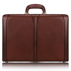 A tribute to the classic briefcase with modern improvements. Find comfort in the well-designed handle. Be secure with the 3-digit locks. Organization is easy with a place for everything, including electronics. And importantly, when extra room is needed, expand the briefcase an extra inch. Features: Full Grain Leather 18.25” x 5.0” x 13.25” and 5.7lbs 3-digit combination lock Gold finish hardware Business organizer File divider Tablet pocket Protective feet Expandable Style #8048 Lawyer Briefcase, Lawyer Bag, Urban Bags, Tom Daley, Leather Laptop Bag, Leather Laptop, Business Bag, Comfortable Tops, Leather Briefcase