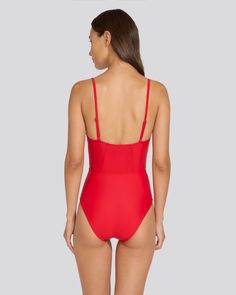 Chic and retro-inspired, The Veronica One-Piece is a luxe staple. This moderate coverage one-piece offers support with underwire cups and adjustable straps. Wear it to the beach or with your favorite pair of pants to double as a bodysuit. Underwire Swimwear With Built-in Cups For Sunbathing, Underwire Bodysuit With Built-in Bra For Vacation, Nylon Swimwear With Built-in Underwire Cups, Nylon Swimwear With Built-in Cups For Pool, Underwire Swimwear With Built-in Bra, Nylon Bodysuit With Built-in Bra For Vacation, Solid Color Underwire Bodysuit For Vacation, Summer Underwire Bodysuit For Sunbathing, Beach Season Shapewear Swimwear