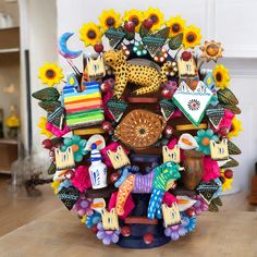 a sculpture made out of various items on a table