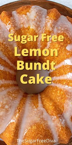 a lemon bundt cake with white icing on a wooden platter that says sugar free lemon bundt cake