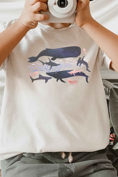 Casual Short Sleeve Shark Design Tops, Casual Short Sleeve T-shirt With Shark Design, Casual Short Sleeve Top With Shark Design, Casual Summer T-shirt With Shark Design, Short Sleeve Graphic Tee With Fish Print, Summer Short Sleeve Tops With Shark Design, Summer Short Sleeve T-shirt With Shark Design, Summer T-shirt With Shark Design And Short Sleeves, Summer T-shirt With Shark Design, Short Sleeve