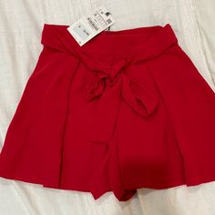 Zara Red Dress Shorts. Never Worn. Side Zip At Waist. Fits True To Size And Sits Mid/High Rise On Waist (Hits Right Above My Belly Button). Size Small. Casual Summer Bottoms For Date Night, Chic Red Bottoms For Going Out, Red High Waist Bottoms For Going Out, Casual Mini Bottoms For Going Out, Casual Mini-length Bottoms For Going Out, Casual Solid Color Shorts For Party, Spring Party Shorts In Solid Color, Red Fitted Shorts For Summer, Mini Bottoms For Date Night In Summer