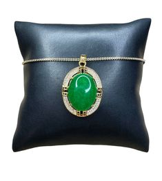 - 18K Gold plated real jade oval pendant encrusted with cubic zirconia stones - Pendant height: 1 1/4" , Pendant width: 7/8" - 18K Gold filled, 1.5 mm box chain, choose length in menu - Jade is a natural stone so please allow for some variance in the shade of green - Can be a jade necklace gift for women or men Oval Necklace, Jade Necklace, Oval Pendant, Jade Pendant, Good Fortune, Box Chain, Necklace Gift, Stone Pendants, Shades Of Green