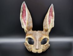 A handmade rabbit mask created by a sculptor working in wax based clay then cast in resin epoxy before being finished and painted, then finally making its way to your front door.  Each mask is made individually and will have some small variation in appearance. Please feel free to message me directly about any kind of customization you may like. Animal Masks Masquerade, Hare Mask, Mask Theater, Halloween Maske, Deer Mask, Theater Mask, Rabbit Mask, Handmade Rabbit, Bunny Mask