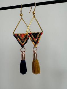 Miyuki beaded asymmetric triangle earrings.  * High quality miyuki jewelry beads. * Tassels decor. * Metal jewelry findings. Colour may vary depending on your screen settings. Miyuki Jewelry, Earrings With Tassels, Beads Tassels, Long Beaded Earrings, Tassels Decor, Jewelry Beads, Miyuki Beads, Triangle Earrings, Chandelier Earrings