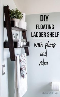 a bathroom shelf with towels and other items on it