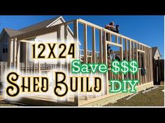 two men are working on the roof of a house that is being built with siding