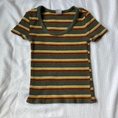 -Never Worn -Green With Brown And Yellow Stripes -Ribbed Texture -Tight And Slightly Cropped -Size Medium Trendy Green Ribbed T-shirt, Retro Striped Ribbed Tops, Retro Ribbed Striped Tops, Fitted Striped Ribbed T-shirt, Green Ribbed Trendy T-shirt, Green Ribbed Scoop Neck Top, Retro Ribbed Summer Top, Retro Ribbed Tops For Summer, Fitted Striped Top With Scoop Neck