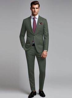 Seasonal colors are a great way to keep your tailoring interesting, so investing in our Huddersfield Stretch Autumn Green Wool Suit is a wise choice. Crafted from a wool blend, this suit ensures both style and comfort. The solid pattern and refreshing autumn green tone render it an excellent selection for leaving a lasting impression at the office, weddings, and other special occasions. 
 
Introducing "Voyager" collection, a truly exceptional fabric that combines luxury and performance. Crafted from super 100's australian merino wool fiber with touch of lycra for flexibility and resillience is enriched with prunelle weave that ensures a lively draping and crease resistance feature. 
  Look Includes     Huddersfield   Stretch   Autumn   Green   Wool  Fabric  Two Button Jacket Style  Notch L Slim Fit Wool Suit With Welt Pockets, Wool Suit And Tie Accessories For Business Casual, Wool Suit With Suit Collar For Office, Fitted Wool Suit For Office, Fitted Wool Suits For Office, Wool Suits With Notch Lapel, Wool Suits With Suit Collar For Office, Custom Fit Wool Suits For Office, Wool Slim Fit Suits For Workwear