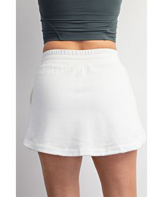 This chic french terry causal skort is an effortlessly stylish piece that prioritizes both comfort and versatility. It features an adjustable drawstring for a customized fit, complemented by an elastic waistband ensuring ease of movement. The skort is thoughtfully designed with practical side pockets and stylish side slits, adding functionality and flair. Whether you're headed to a casual outing, planning a picnic, lounging at home, or engaging in a leisurely game of tennis, this skort is the pe Planning A Picnic, White Sky, French Terry Fabric, French Terry, Elastic Waist, Tennis, Elastic