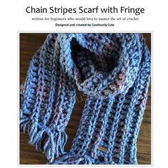 a knitted scarf with fringe is featured in this article