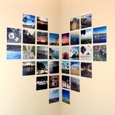 a room with several pictures arranged in the shape of a cross on it's wall