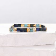 Asa - Bracelet de perles Elegant Multicolor Rectangular Bracelet, Bohemian Stretch Bangle Bracelet With Letter Beads, Elegant Blue Friendship Bracelets With Colorful Beads, Bohemian Beaded Bangle Bracelets With Letter Beads, Bohemian Heishi Beads Stretch Bracelet As Gift, Bohemian Stretch Bracelet For Jewelry Making With Letter Beads, Bohemian Letter Beads Bracelet, Elegant Friendship Bracelets With Colorful Beads, Elegant Beaded Braided Bracelets