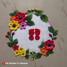 a white table topped with lots of colorful flowers