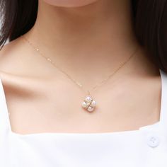 This exquisite piece features a delicate clover pendant adorned with intricate details, symbolizing good fortune and prosperity. Crafted with meticulous attention to detail, the necklace exudes elegance and sophistication. Whether worn for everyday elegance or special occasions, this necklace adds a touch of whimsical beauty to any ensemble. Metal: 14K Gold Filled Gemstone: Freshwater Pearl Chain Diameter: 450mm(includes adjustable chain) Flower Pendant Charm Necklaces For Weddings, Gold Plated Flower Shaped Necklace For Wedding, Gold Plated Flower Shaped Wedding Necklaces, Elegant Gold Flower Pendant Necklace, Wedding Gold Plated Flower Shaped Necklace, Elegant Gold Plated Pendant Flower Necklace, Elegant Yellow Gold Flower Pendant Charm Necklaces, Elegant Gold-plated Flower Pendant Necklace, Elegant Gold Flower Necklace With Clavicle Chain