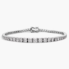 This stunning tennis bracelet flaunts gorgeously graduating diamonds claw-set in luxurious 14k white gold for a look of timelessly classic sophistication. Diamond Tennis Bracelet, Tennis Bracelet Diamond, Blue Nile, Diamond Fashion, Tennis Bracelet, Fashion Bracelets, Jewelry Bracelets, Tennis, Diamonds