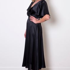 The Denise dress is cut from fluid silk in timeless black that floats over the body. It has flared sleeves, a flattering V-neckline and a delicate belt to define the waist. 94% Silk6% ElastanDry Clean Only Small Roses, Red Studio, Roses Are Red, Blazer With Jeans, Independent Designers Fashion, Dress Clothes For Women, Flared Sleeves, Coat Dress, Badger