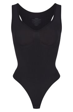 Sculpting Sleeveless Bodysuit With Medium Bust Support, Seamless Shapewear Leotard, Shaping Seamless Leotard Shapewear, Shaping Seamless Leotard, High Stretch Shapewear Bodysuit With Built-in Bra, Black Underbust Bodysuit With Built-in Bra, Full Coverage Seamless Shapewear, Fitted Seamless Shapewear With Scoop Neck, Fitted Seamless Scoop Neck Shapewear