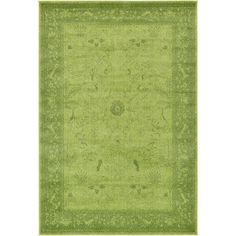 a green rug with an intricate design on the top and bottom corner, in front of a white background