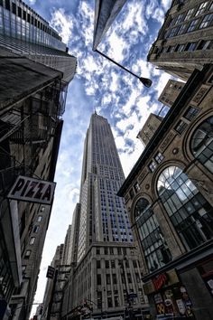 looking up at the tall buildings in new york city